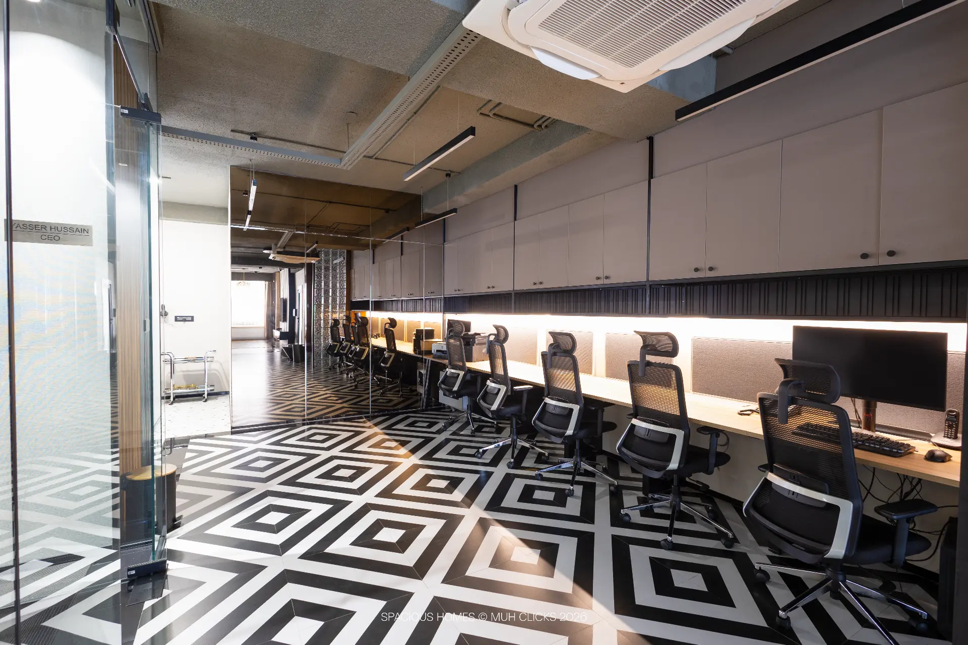 Spacious Home Office — open workstations beside the CEO cabin