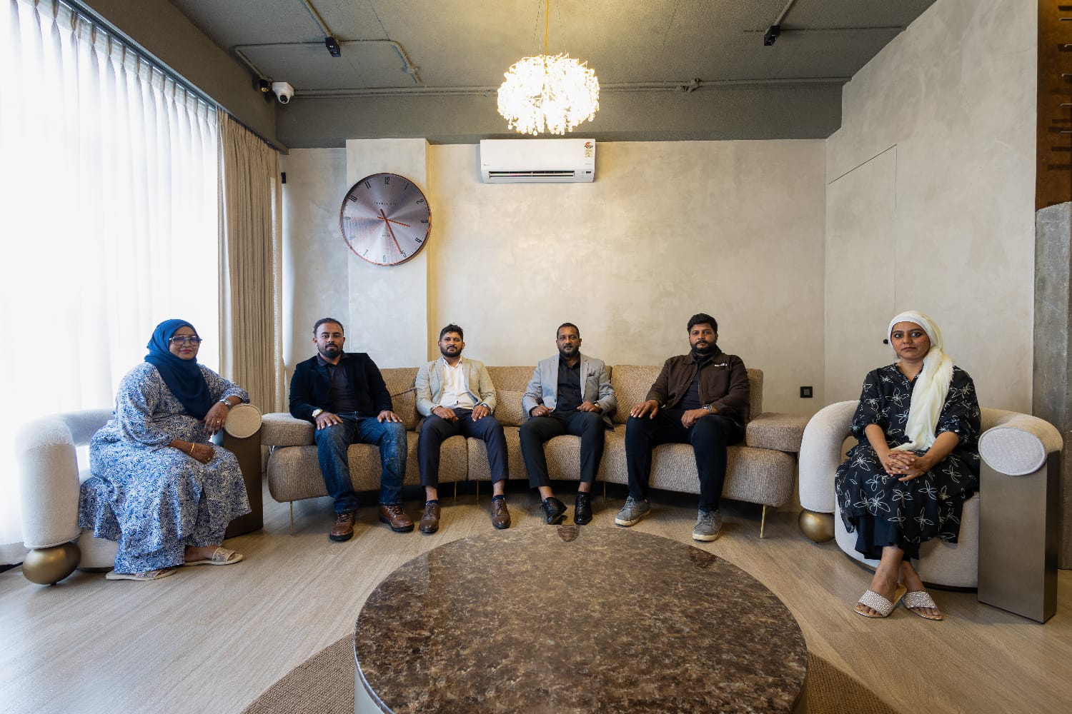 The Spacious Homes team together in the studio